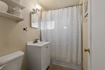 Guest bath with full bathroom, shower and tub combination